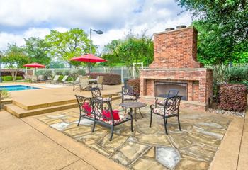 Outdoor fireplace with seating
